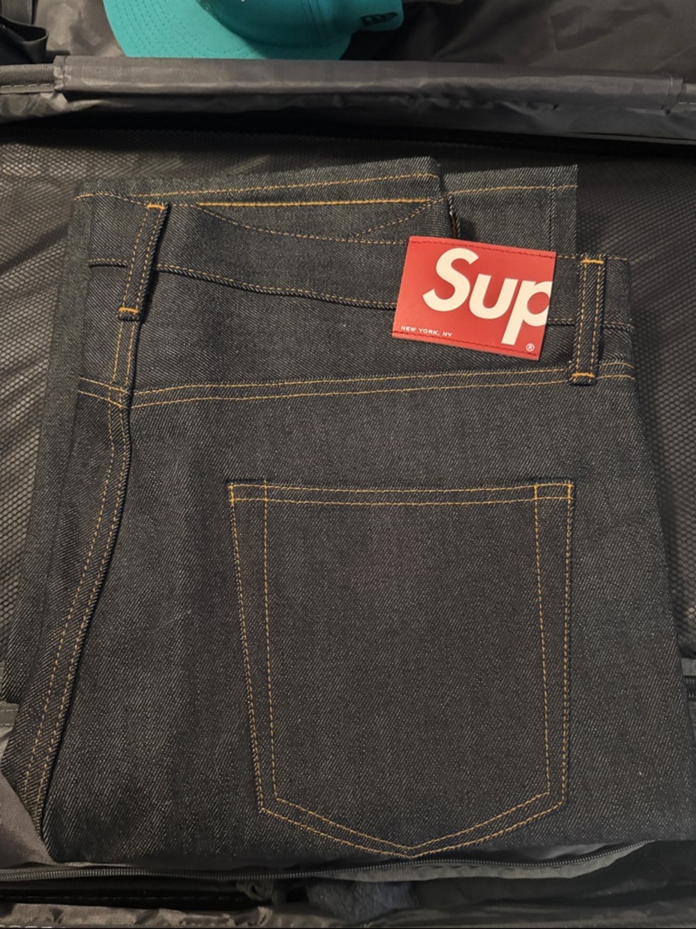 Supreme Men’s Dark Indigo Straight Denim Jeans with Contrast Stitching